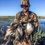 captain brian sawyer with freshly harvested waterfowl