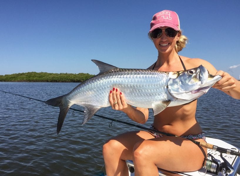an angler with a tarpon that was just caught in Homosassa, Florida